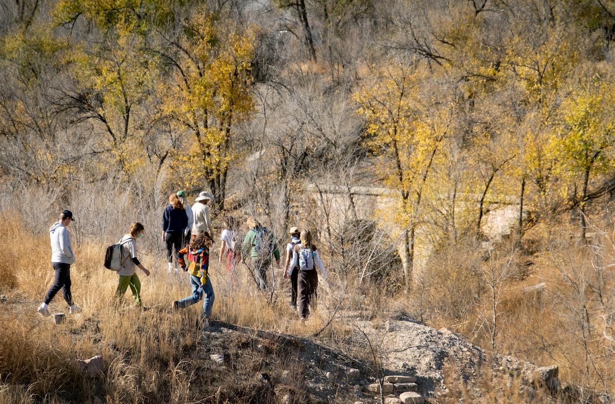 Students walking around an abandoned urban park area